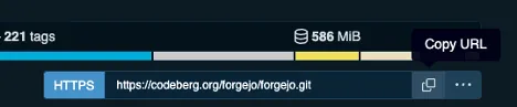 Screenshot of the repository metadata and clone URL section in the web interface. It shows repository details like "221 tags" and a storage size of "586 MiB". Below this, an input field displays the repository HTTPS URL with a blue HTTPS label on the left and a clipboard copy icon on the right, which triggers a "Copy URL" tooltip.