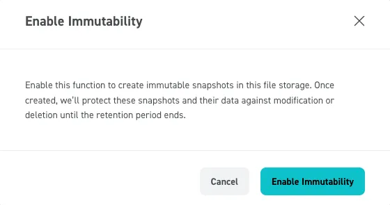 Screenshot of the "Enable Immutability" confirmation pop-up window in the STACKIT Portal. The modal dialog contains an explanatory text stating that enabling the function will protect snapshots and their data against modification or deletion until the retention period ends. At the bottom right, a "Cancel" button and an "Enable Immutability" action button are displayed.